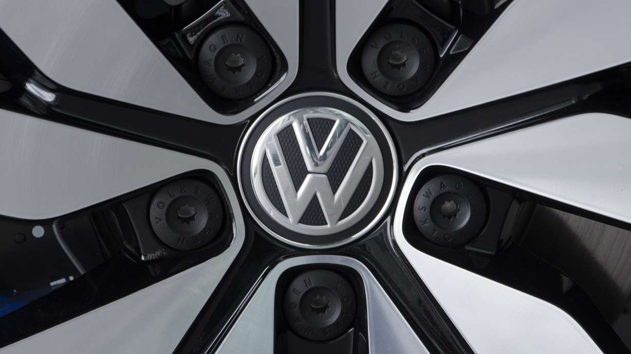 An e-Golf electric car with the VW logo on a rim is pictured in the German car manufacturer Volkswagen Transparent Factory in Dresden, eastern Germany, April 28, 2017. Russia's devastating war on Ukraine is bringing a whole set of new problems to the global auto industry.