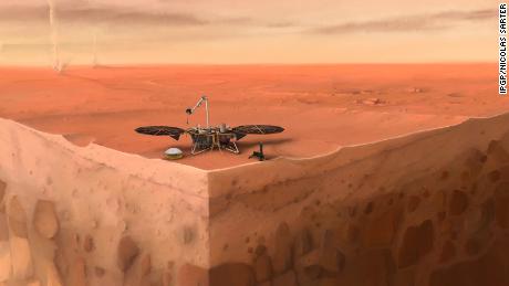 La ilustración muestra el módulo de aterrizaje InSight de la NASA sentado en la superficie de Marte con capas debajo de la superficie del planeta.