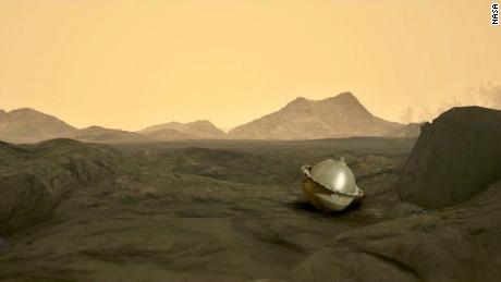 Esta ilustración muestra la sonda después de que alcanzó la superficie de Venus.  Las alturas florales se pueden ver en el fondo.