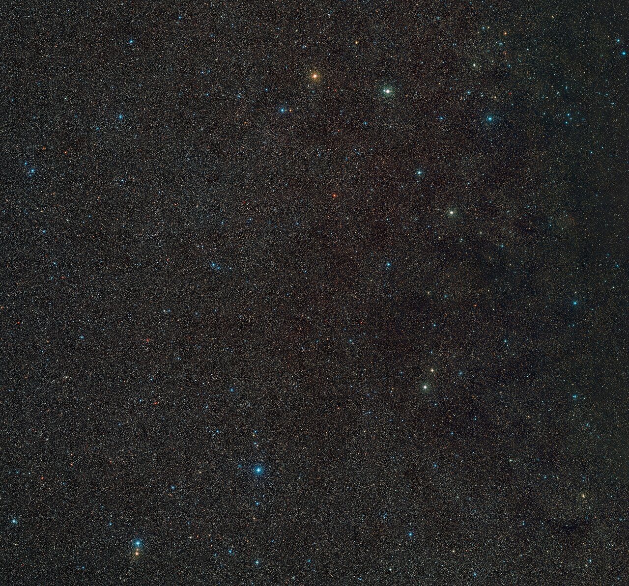 Una imagen de una zona del espacio que contiene cientos de estrellas distantes.